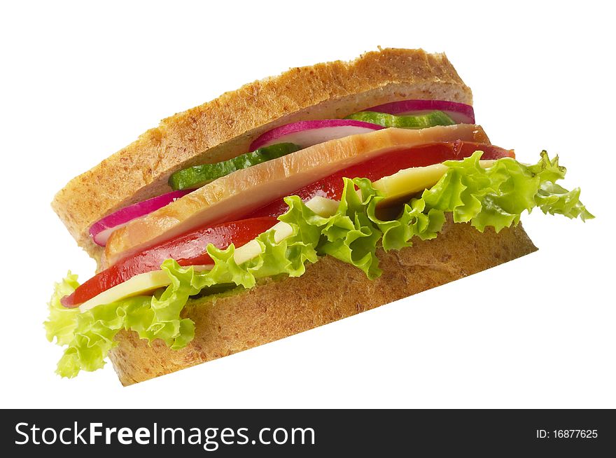 Sandwich with ham, tomato, radish, cucumber and cheese isolated over white background. Sandwich with ham, tomato, radish, cucumber and cheese isolated over white background