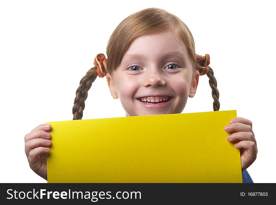 Little funny girl with yellow sheet of paper in the hands isolated over white background. Little funny girl with yellow sheet of paper in the hands isolated over white background