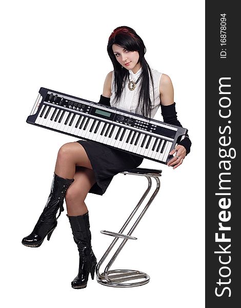 Beautiful Girl Sitting With Synthesizer Isolated