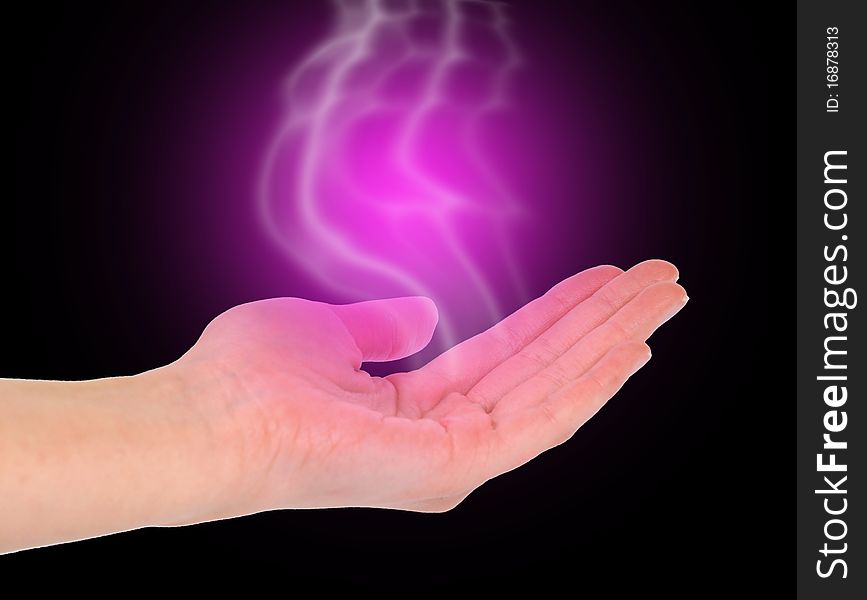 Open woman hand with smoke in pink light. Open woman hand with smoke in pink light