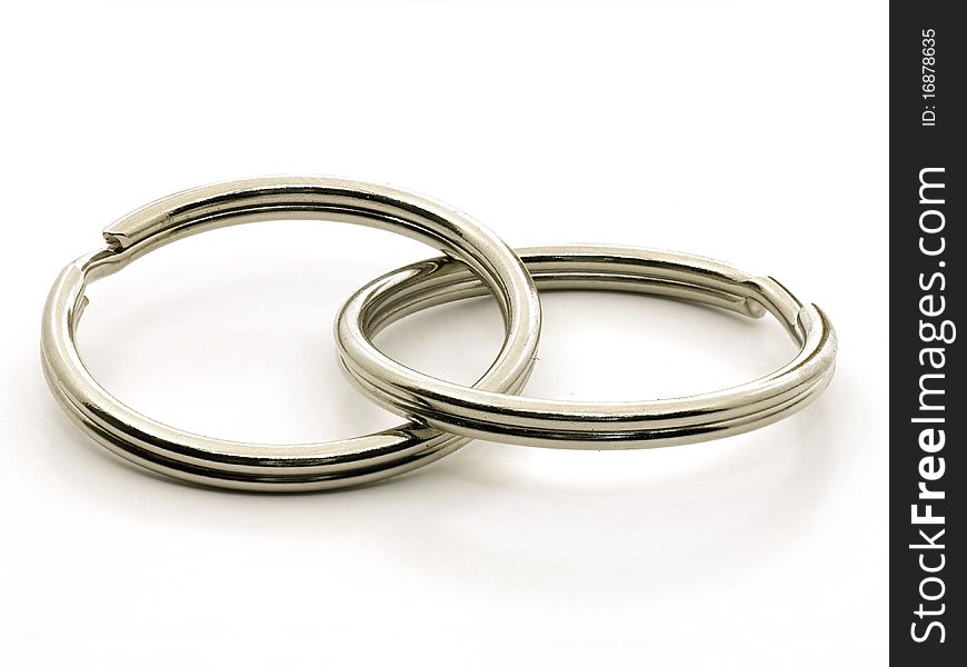 Two interlocking key chain rings isolated on the white background. Two interlocking key chain rings isolated on the white background