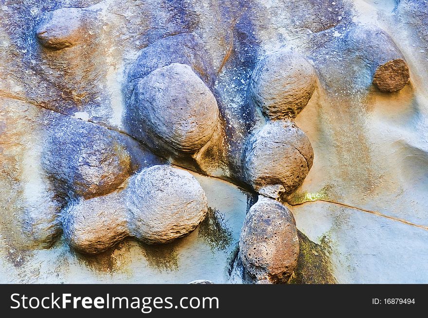 Abstract closeup of colorful eroded texture on the beach. Abstract closeup of colorful eroded texture on the beach