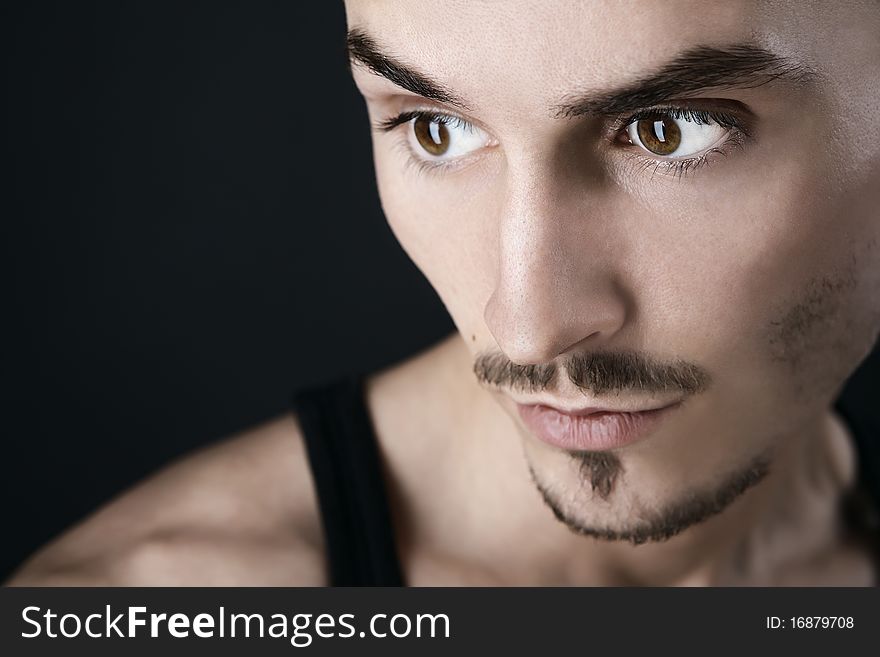 Young man's portrait. Close-up face.