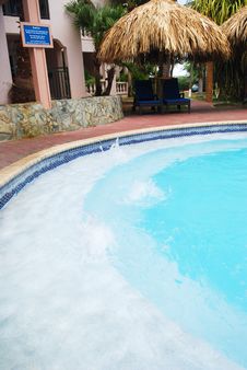 Luxury Resort Pool And Hotel Garden In Aruba. Royalty Free Stock Photos