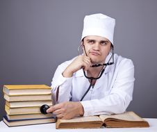 Young Male Doctor Studying Medical Books Stock Images Young Male Doctor Studying Medical Books Stock Images