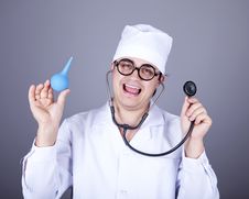 Crazy Doctor With A Stethoscope And Enema. Stock Image
