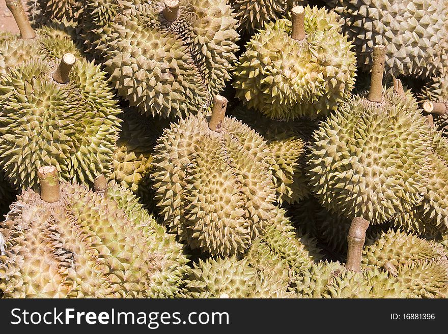 Heap of durians at a market in Asia