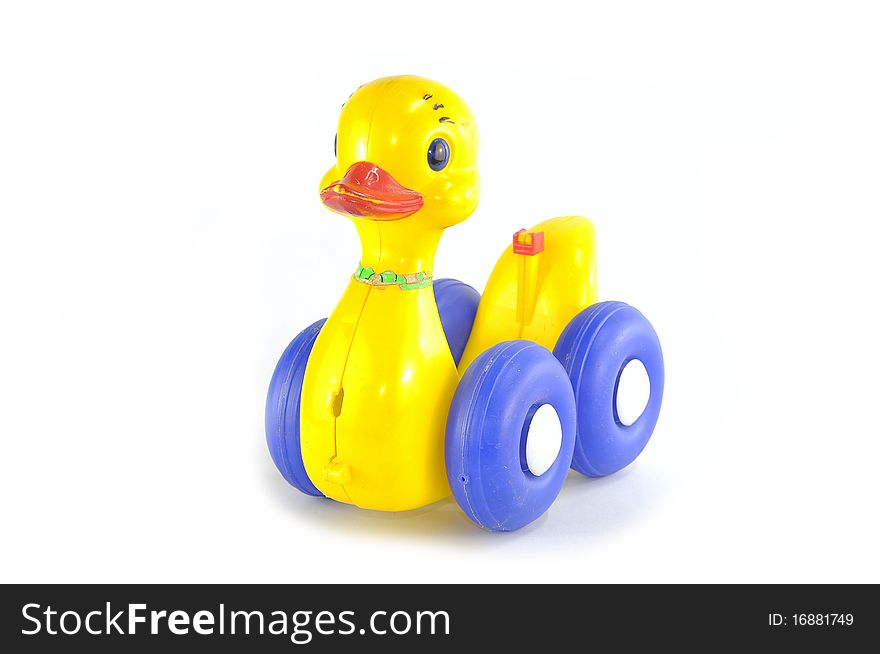 Old yellow duck toy on white background. Old yellow duck toy on white background