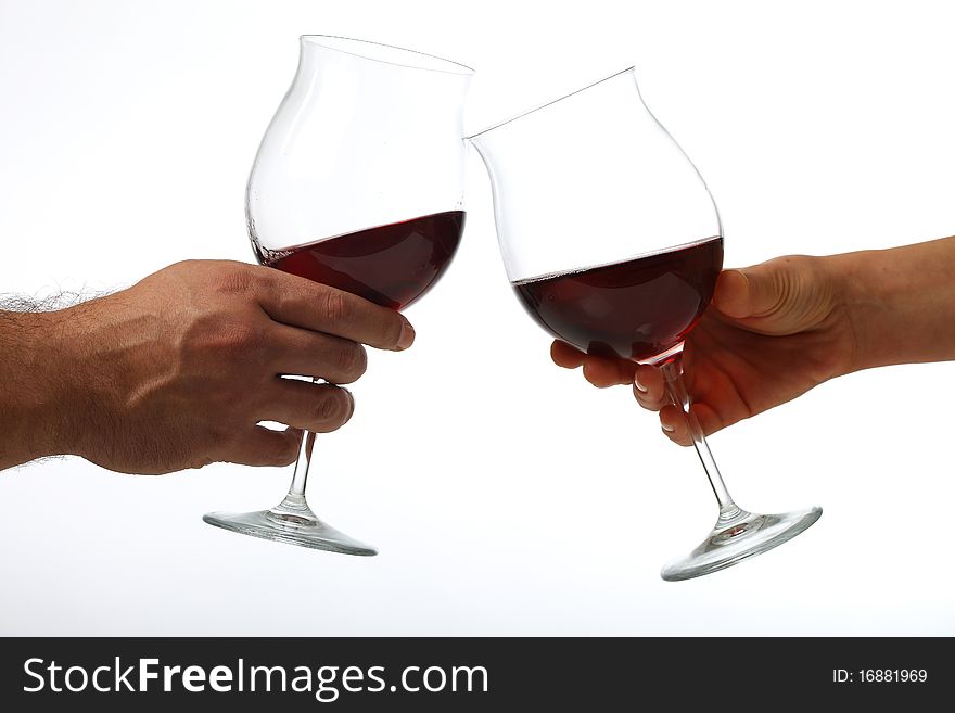 Man and woman toasting glasses of wine