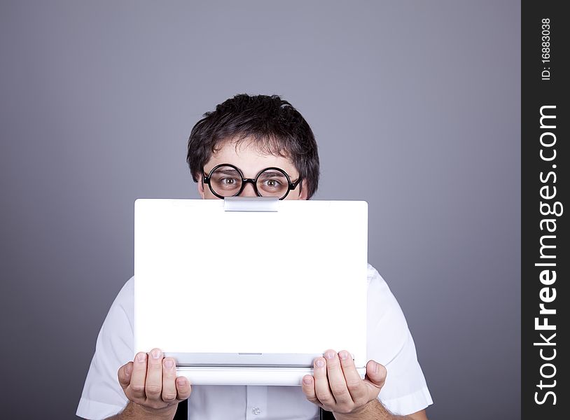 Men in suspender with notebook.