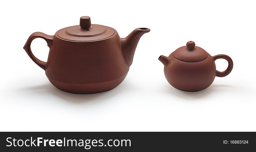 Clay teapots isolated on white background