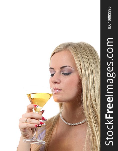 Luxuriously young blond woman drink Martini. Luxuriously young blond woman drink Martini