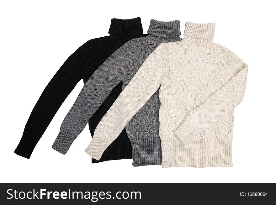 Three Modern  Sweaters On A White.