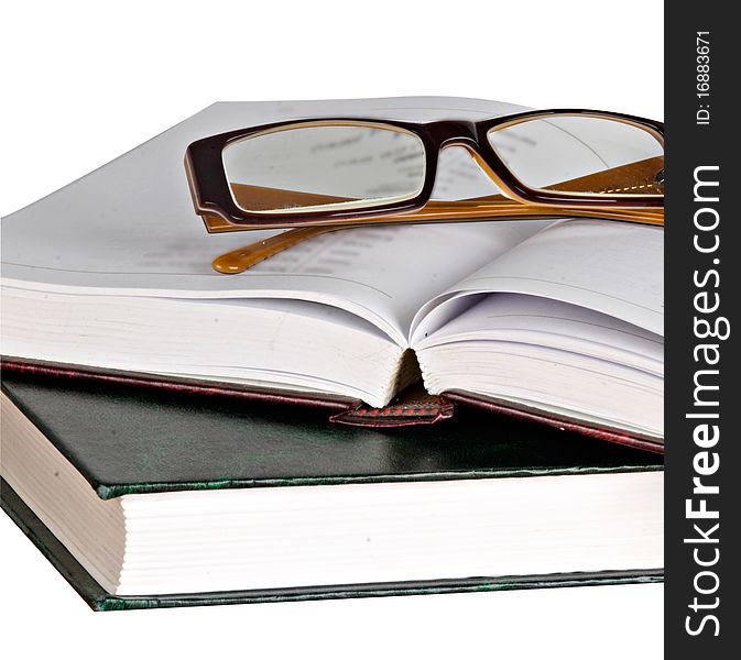 Eyeglasses On Open Book