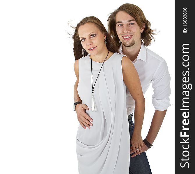 Young european cute couple with long hair isolated over white background. Young european cute couple with long hair isolated over white background.