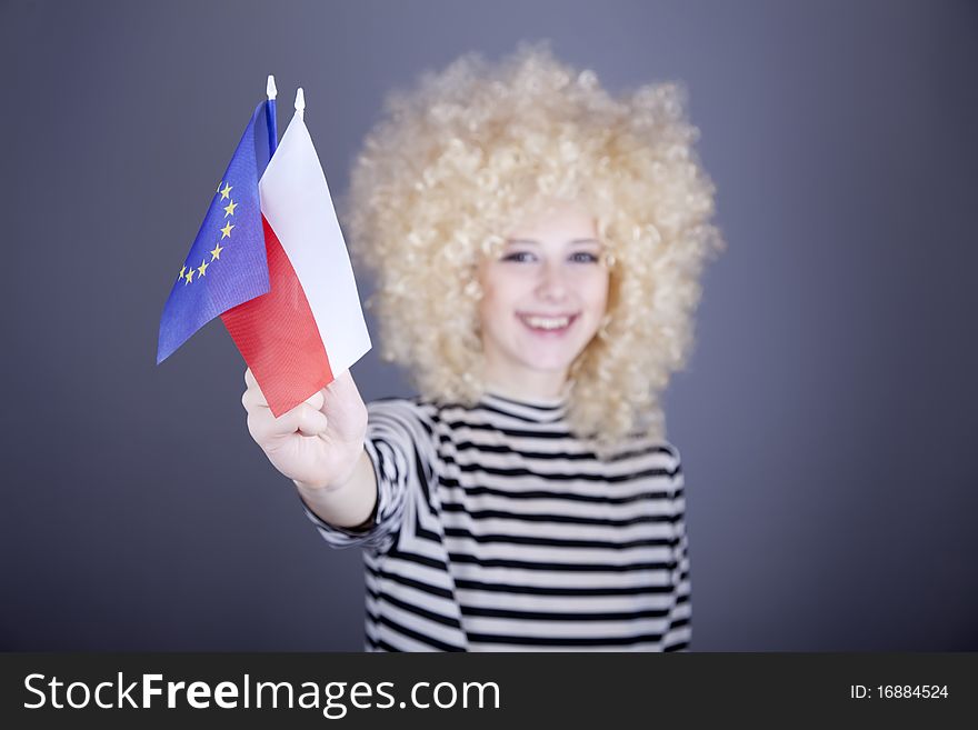 Girl with European Union and Poland flag.