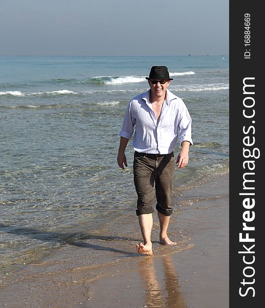 Man enjoying a beautiful seascape. Man enjoying a beautiful seascape