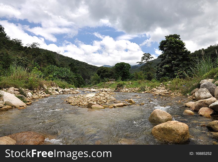 A small stream in the mountains. This area used to flood a long time ago. A small stream in the mountains. This area used to flood a long time ago.