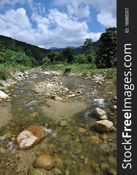 A small stream in the mountains. This area used to flood a long time ago. A small stream in the mountains. This area used to flood a long time ago.