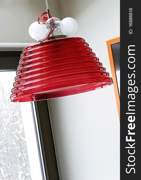 Red lamp with christmas decoration