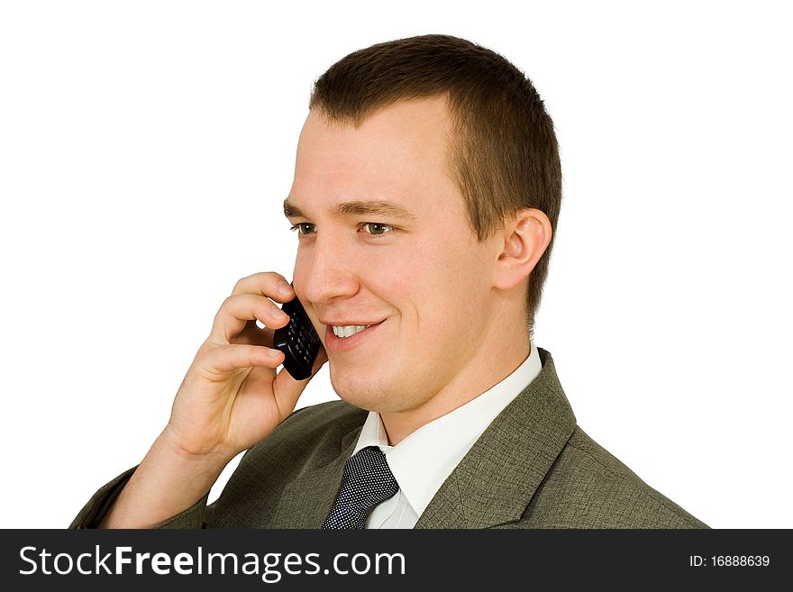 A young man with a mobile phone, on white background. A young man with a mobile phone, on white background