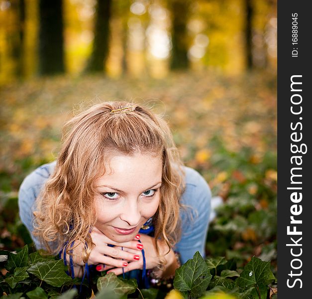 Girl In Autumn Park