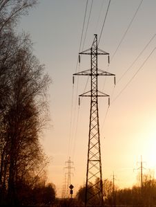 Electricity Pylons And Lines At Dusk. Stock Photos Electricity Pylons And Lines At Dusk. Stock Photos