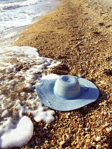 Sea And Women`s Hat On A Shingle Beach Stock Photo Sea And Women`s Hat On A Shingle Beach Stock Photo