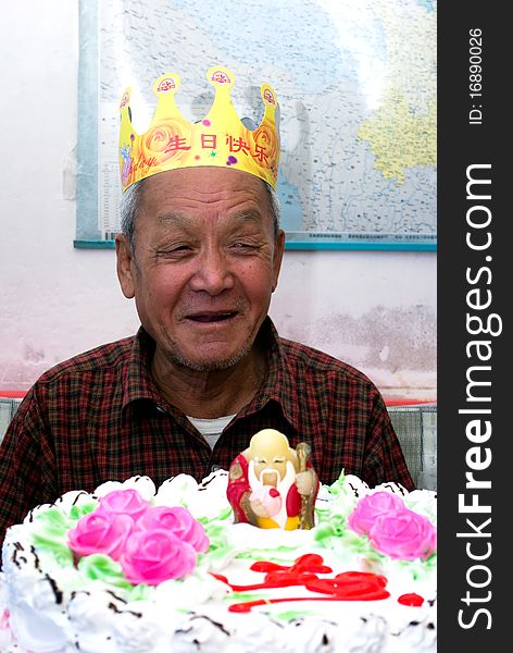 An old man's birth with birthday cake. An old man's birth with birthday cake