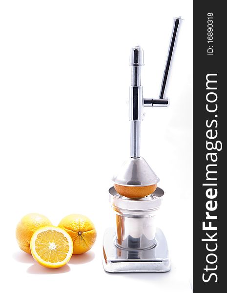 Make juice from oranges with a tool. Make juice from oranges with a tool