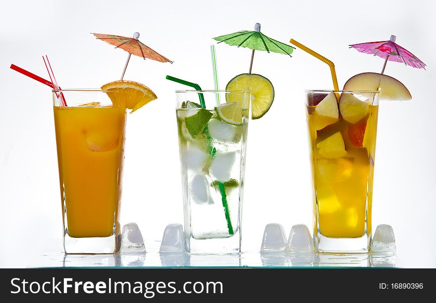 Drinks and fruits on white background