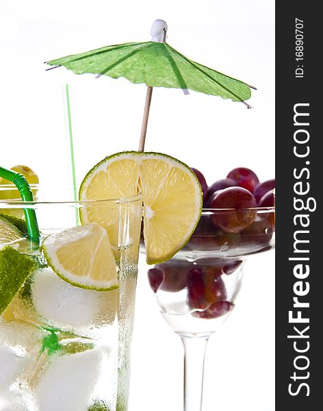 Drinks and fruits on white background