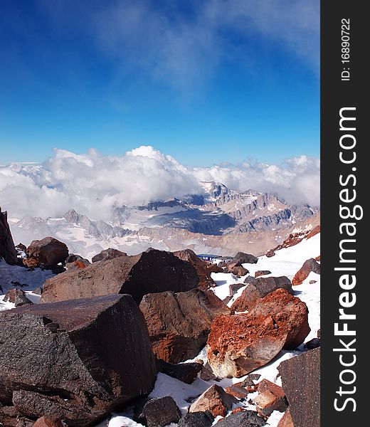 Mountains with snow and stone on foregrounds. Mountains with snow and stone on foregrounds