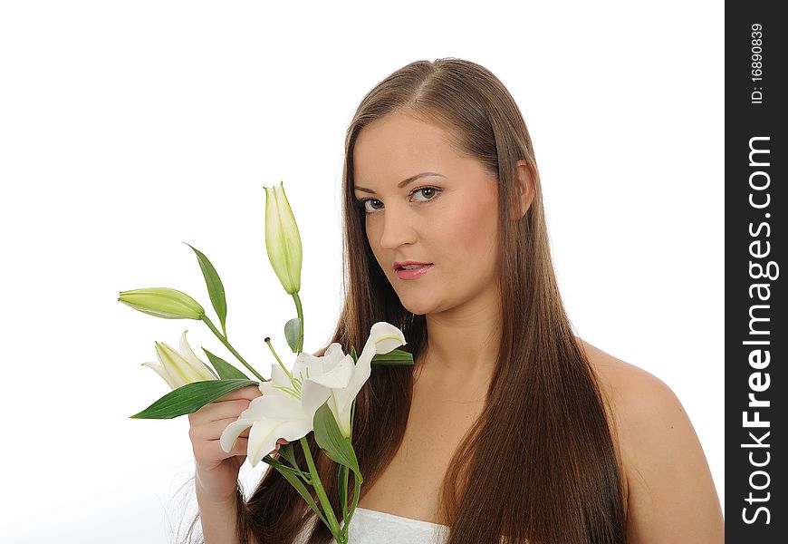 Beautiful woman with pure healthy skin and long hair smelling 2 pink flowers. isolated on white background. Beautiful woman with pure healthy skin and long hair smelling 2 pink flowers. isolated on white background