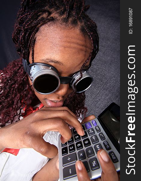 Afro american in glasses with calculator. Afro american in glasses with calculator