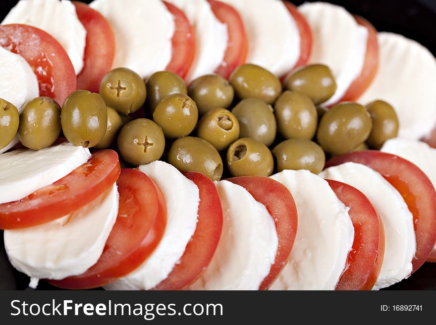 Mozzarella, tomatoes and olives