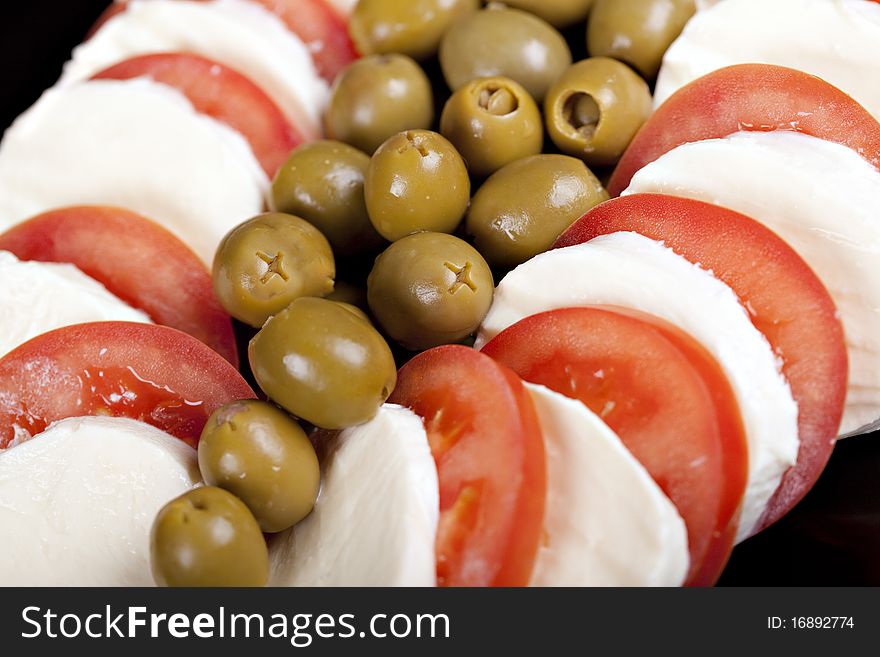 Mozzarella, tomatoes and olives