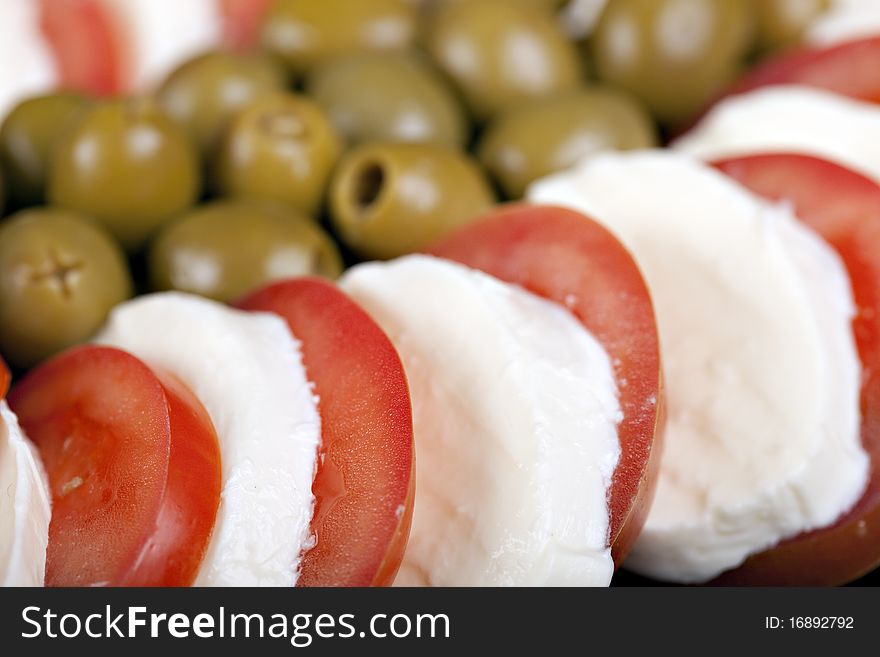 Mozzarella, tomatoes and olives - fresh and healthy food