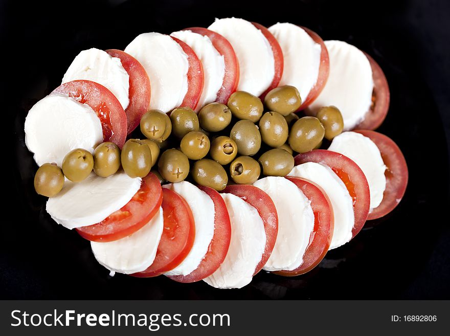 Mozzarella, tomatoes and olives