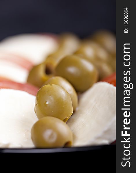 Mozzarella, tomatoes and olives - fresh and healthy food