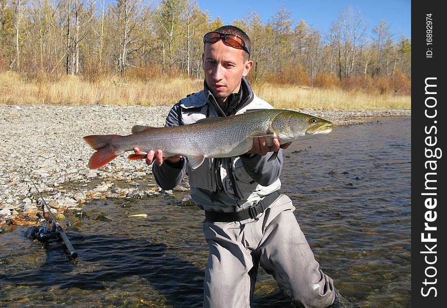 Fishing - fisherman catch big fish