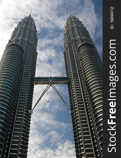 Centre view of Petronas Towers Portrait with blue sky background