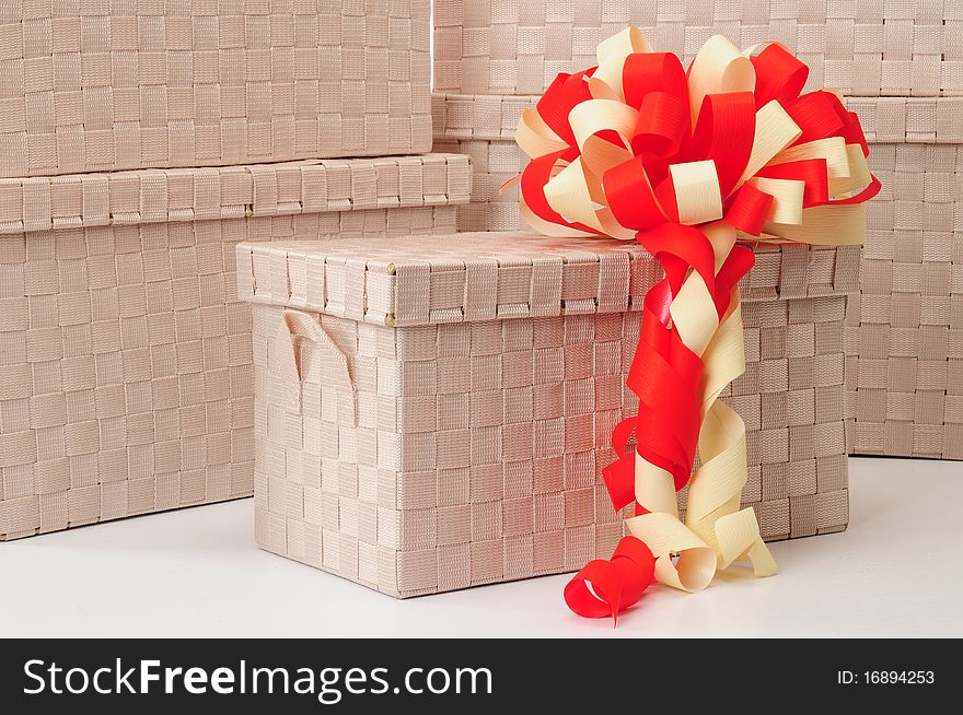 Christmas ribbon over stack of boxes. Christmas ribbon over stack of boxes.