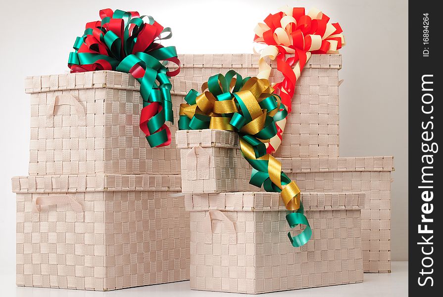 Christmas ribbon over stack of boxes. Christmas ribbon over stack of boxes.