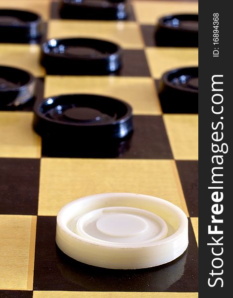 Part of a checkers game. Part of a checkers game