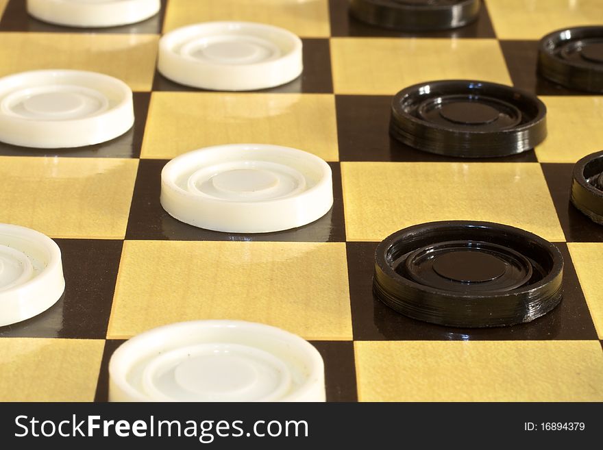 Part of a checkers game. Part of a checkers game