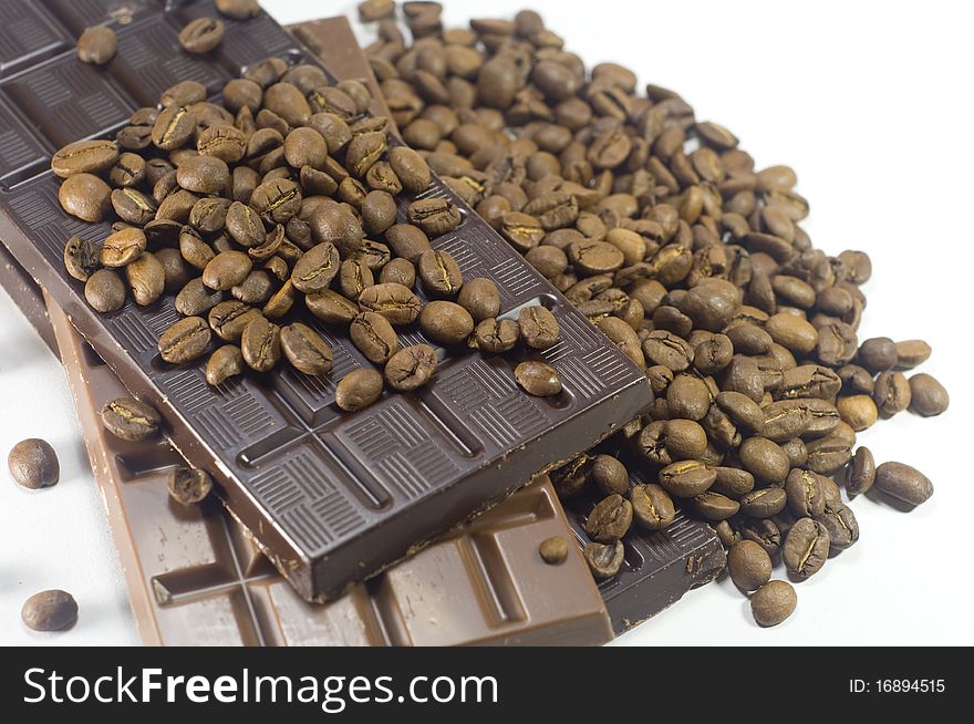 Chocolate bars with coffee beans on it, isolated on white background. Chocolate bars with coffee beans on it, isolated on white background