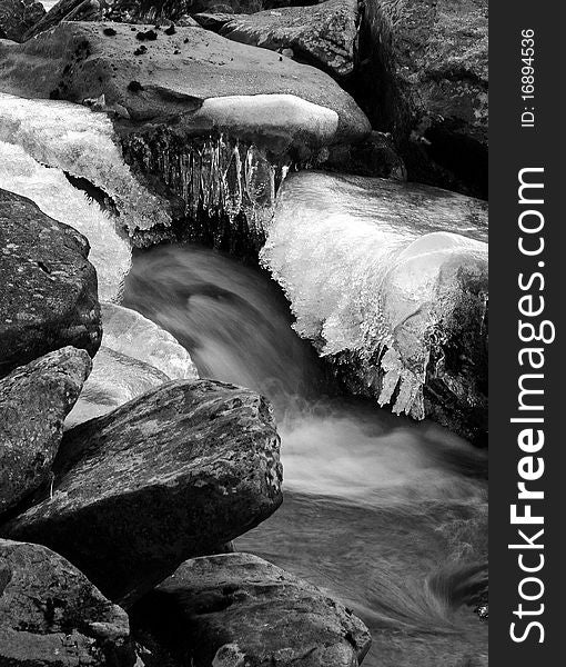 Abstract ice crystals on a shallow stream. Abstract ice crystals on a shallow stream