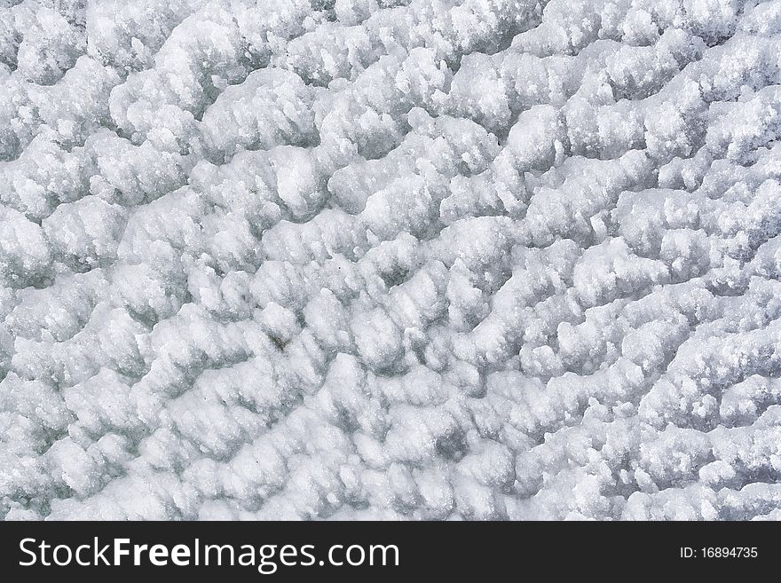 Texture of icy snow, details of ice crystals