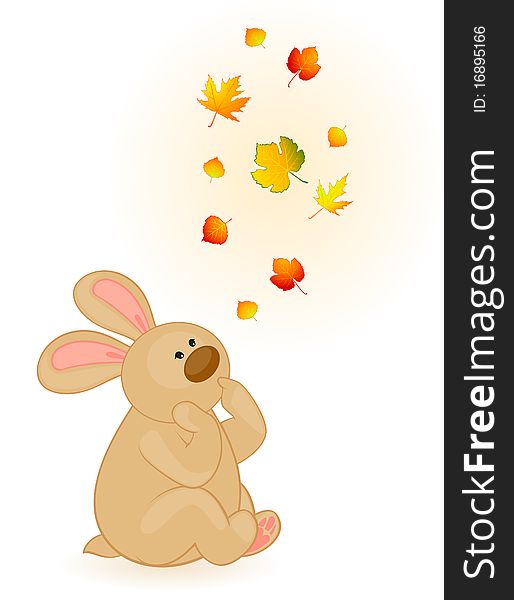 Cartoon little toy bunny with autumnal leaves